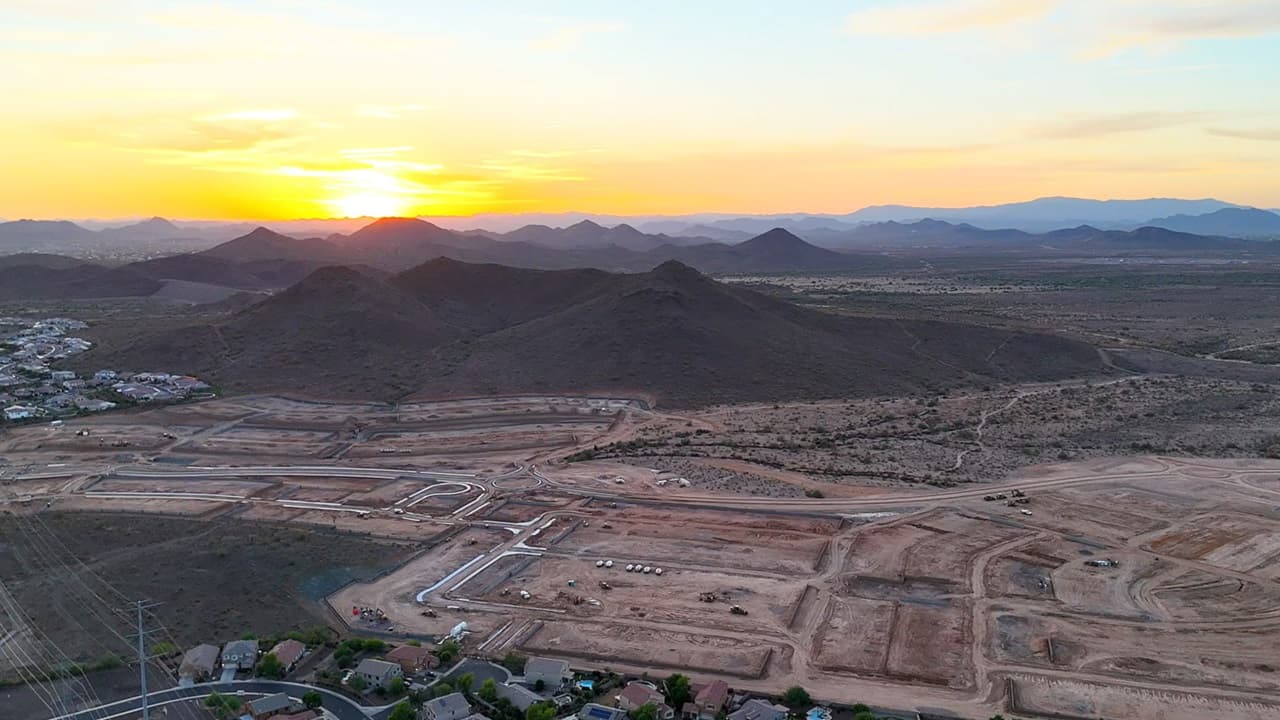Official aerial view of the Stone Butte development and nearby desert mountains